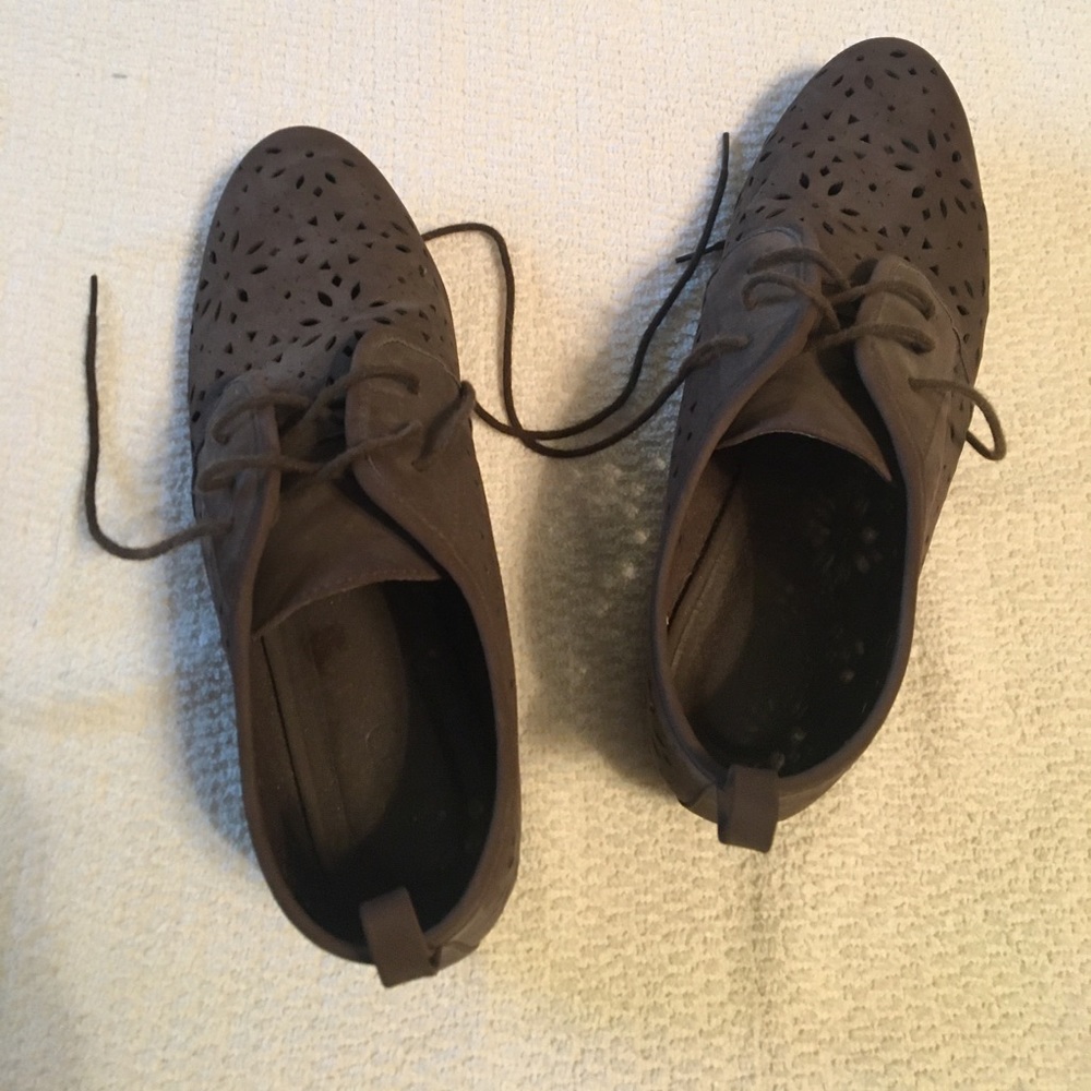 Cato brown suede.  Like material with cut outs